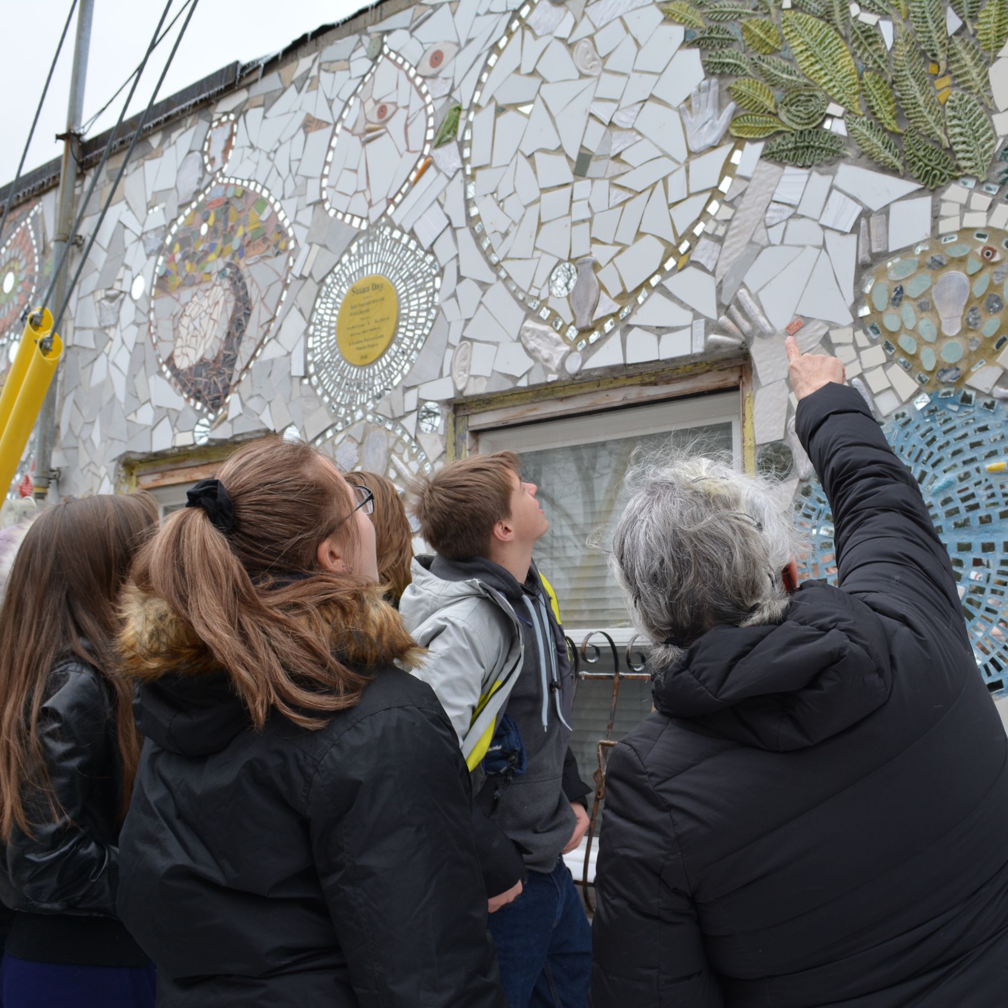 Grade 11 Students getting inspiration from Susan Day's mosaics in Old East Village, London, ON