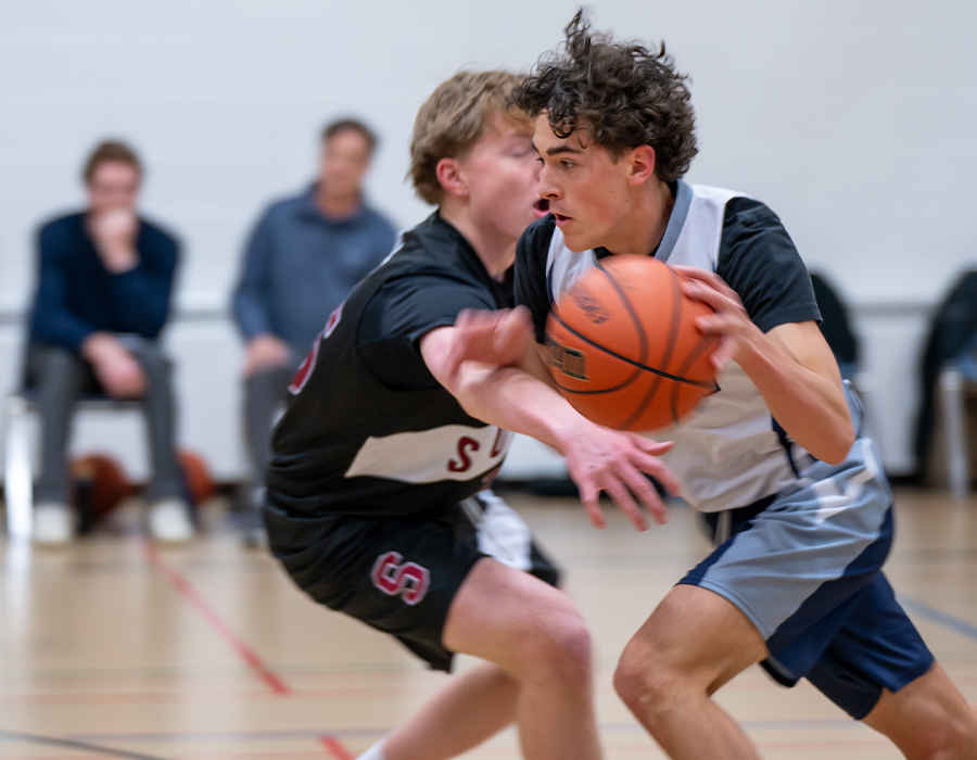 Students playing basketball