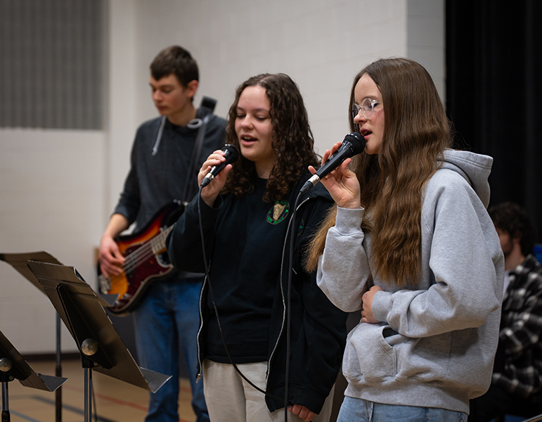 Students singing in Worship